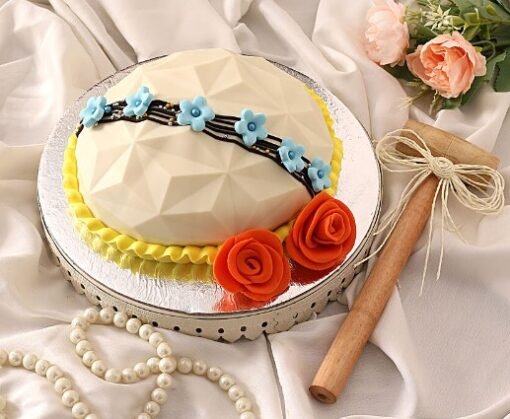 Floral Pinata Cake with Gems – A Beautifully Decorated Cake with Sweet Surprises.
