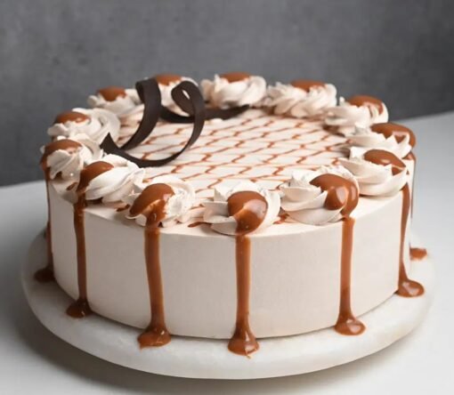 Sweet Caramel Whipped Drip Cake with creamy whipped frosting and caramel drizzle