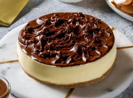Nutella Royale Cheesecake - Velvety cheesecake topped with rich Nutella and hazelnut flavors