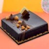 Luxurious Belgium Chocolate Truffle Cake topped with velvety chocolate ganache