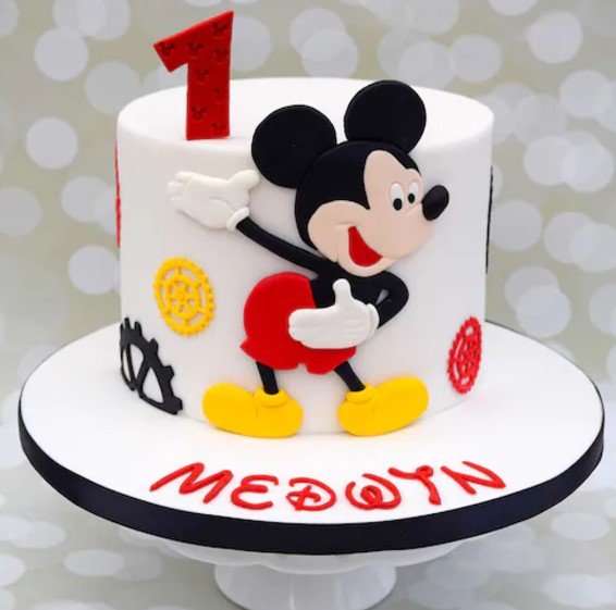 Screenshot 2024-12-06 130341 Mickey Mouse fondant birthday cake with cheerful design for celebrations
