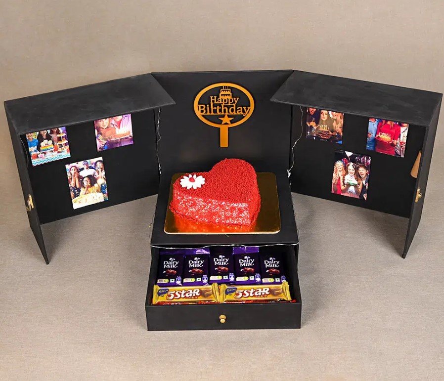 Screenshot 2024-12-06 225340 Luxurious Red Velvet Cake and Chocolate Gift Box filled with indulgent treats.