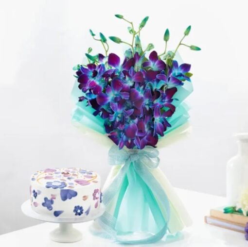Elegant Blue Orchids beautifully arranged with a delicious treat, creating a perfect gift for birthdays, anniversaries, and special occasions.