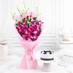 Elegant Purple Orchids with a delicious Black Forest Cake, a perfect gift for birthdays, anniversaries, and romantic surprises.