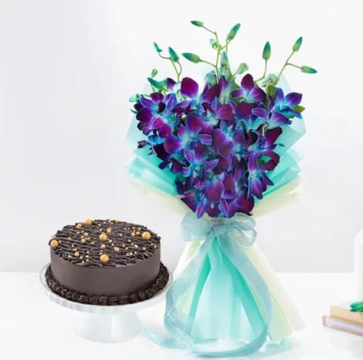 Elegant bouquet with a delicious cake, making the perfect gift for birthdays, anniversaries, and heartfelt celebrations.