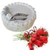 A luscious creamy vanilla cake paired with fresh roses, creating a beautiful and delicious combination for special occasions.