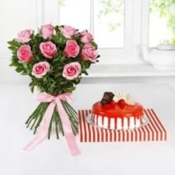 A stunning floral arrangement with a delicious cake, ideal for expressing love and joy on special occasions.